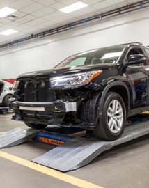 Toyota on vehicle lift | Koch Route 2 Toyota in Lancaster MA